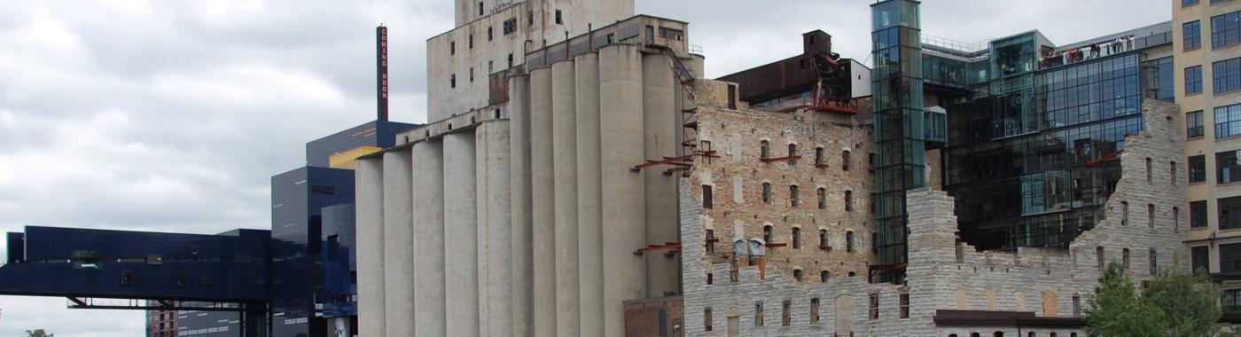 Modern blue Guthrie Theater and Mill City Museum Ruins