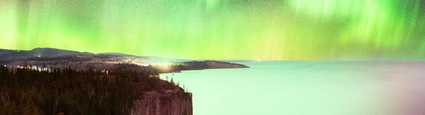 Cliffs in Northern MN with Northern Lights sky